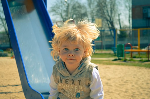 Child Playing in Playground