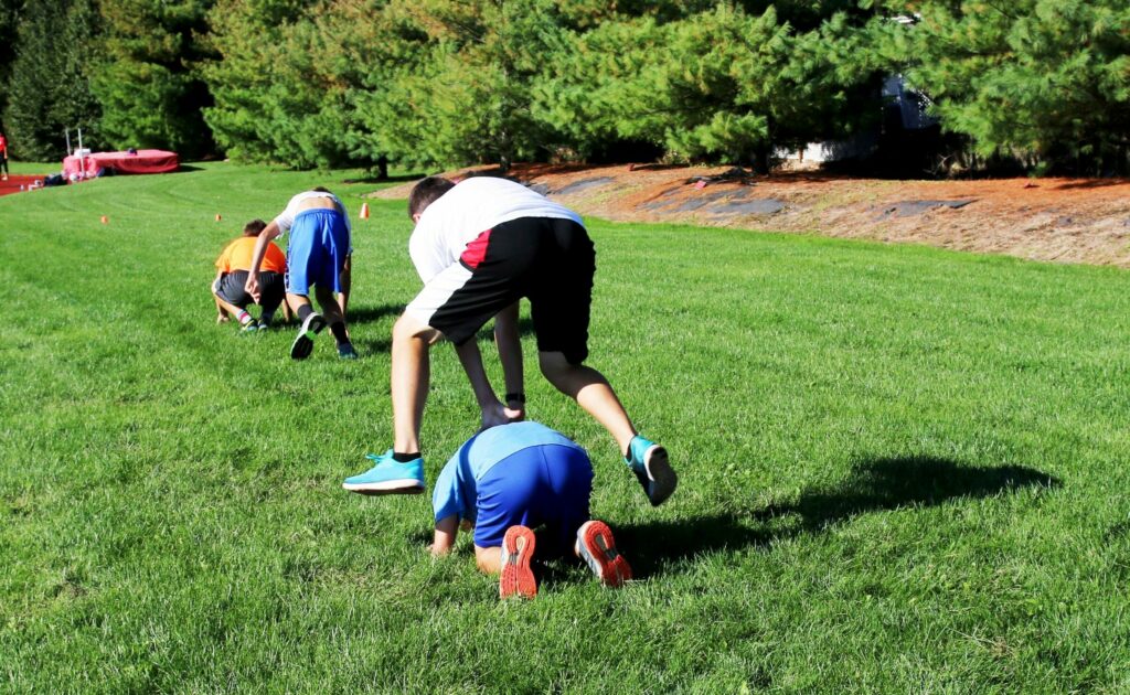 Children playing leapfrog