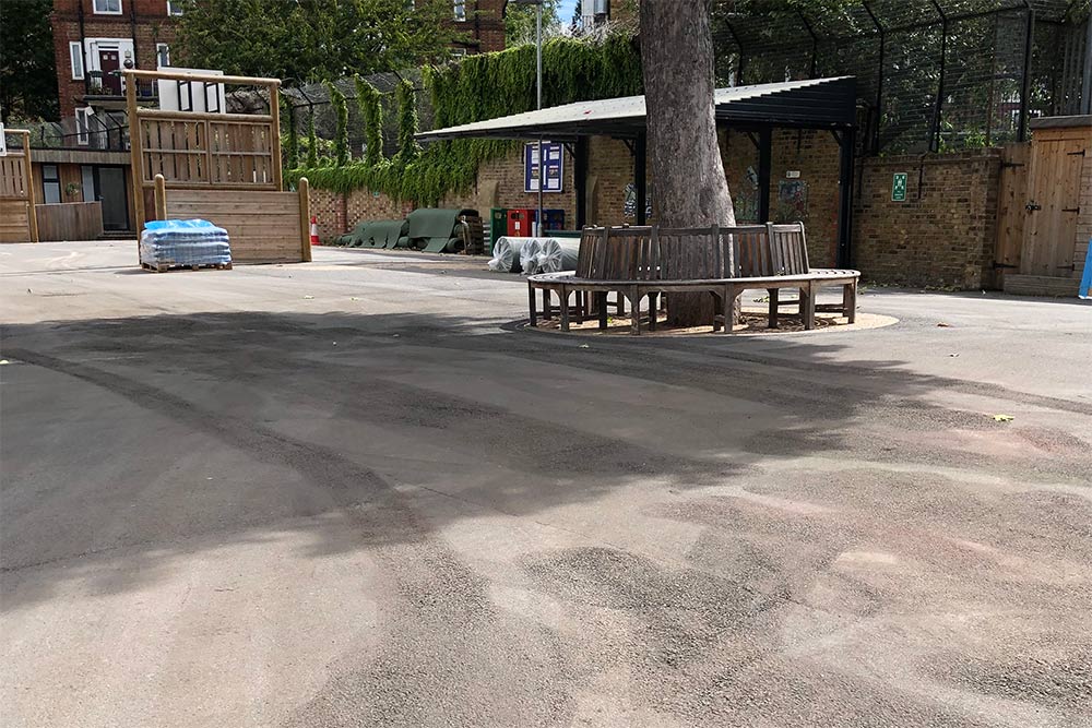 a playground after water jet removal has removed markings