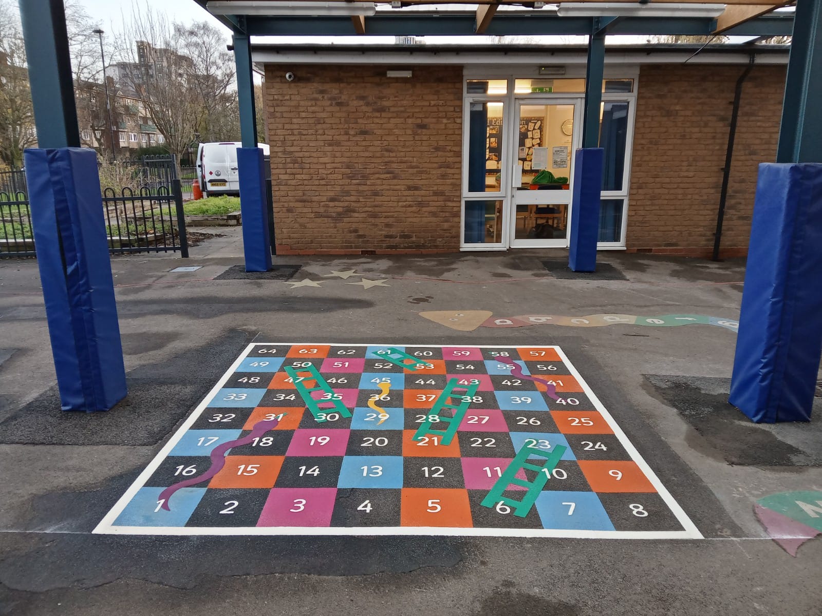 checkerboard playground markings with alternating colours and numbers